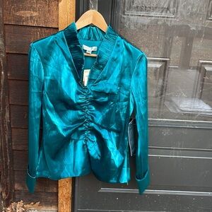 Coldwater Creek teal Silky blouse fully lined.